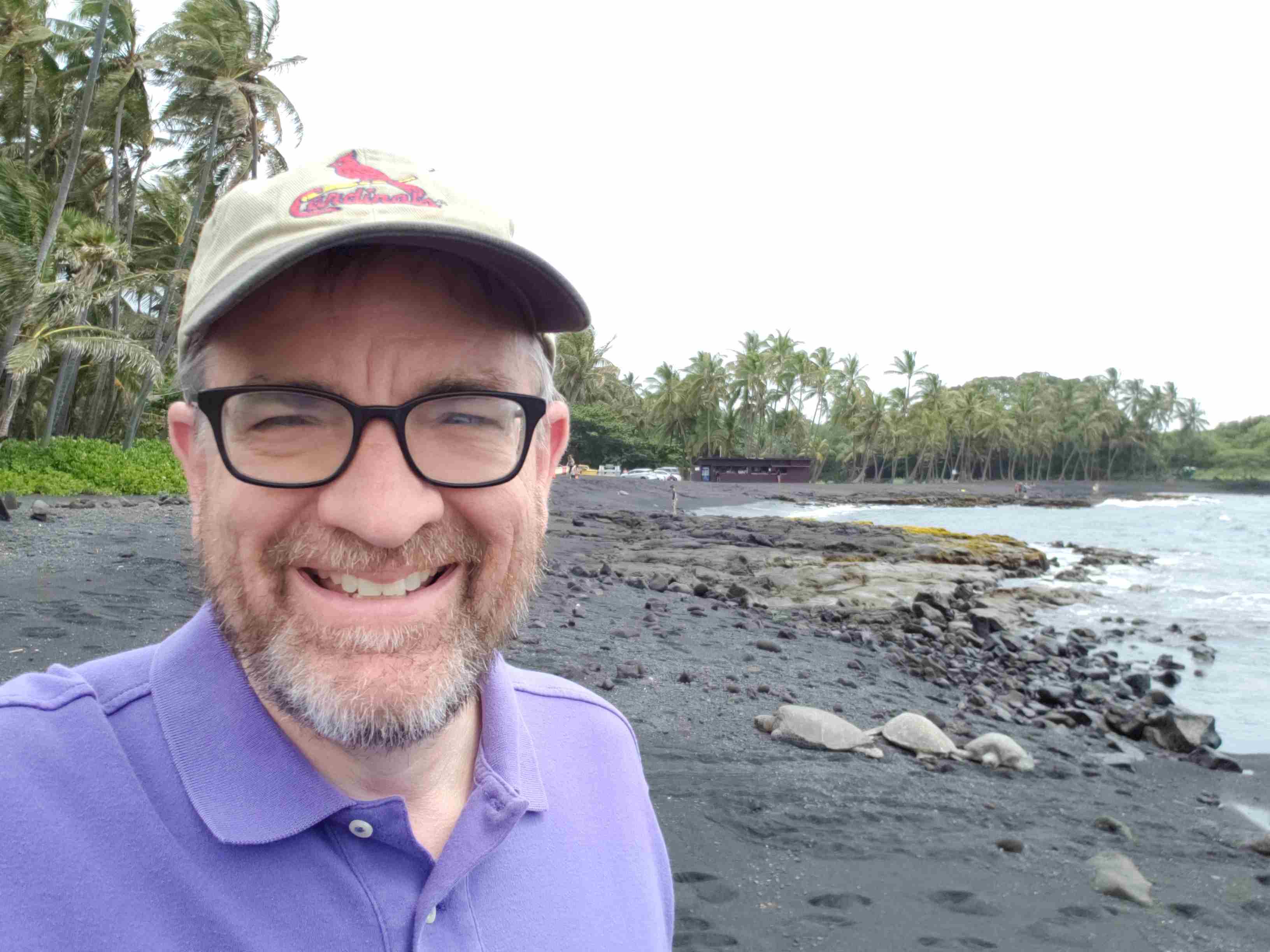 2018-05-20 R at Punaluu Beach with 3 turtles.jpg